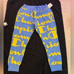 NWT Champion Women XL Reverse Weave pants in blue w/Yellow Monogrammed Logo Prin
